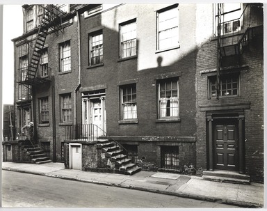 Berenice Abbott (American, 1898-1991). <em>Minetta Street, # 2,4,6</em>, November 21, 1935. Gelatin silver photograph, sheet: 7 3/8 x 9 3/8 in. (18.7 x 23.8 cm). Brooklyn Museum, Brooklyn Museum Collection, X858.51 (Photo: , X858.51_PS9.jpg)