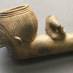 Carved Pipe with Human Face on Bowl