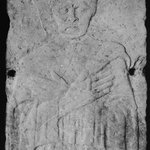 Carved Tomb Slab.  Relief, half-length portrait of beardless manwith eyes closed, hands crossed on breast.