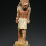 Statuette of a Striding Man