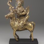 Achi Chokyi Drolma on a Horse