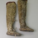 Mans Pair of Thigh-high Boots with red fabric decoration