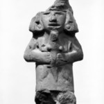Figurine of Woman Holding Four-Legged Animal