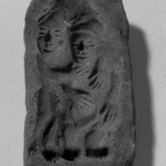 Mold of Two Figures Embracing Each Other