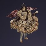 One of a Collection of Briscada Angels and Doll Heads with Wings