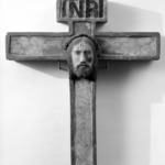 Cross with head of Christ at center