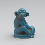 Figure of Monkey Seated on Ovoid Base