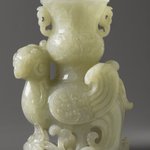 Carved white jade vase