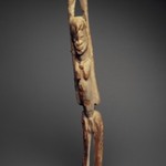 Standing Figure with Arms Raised