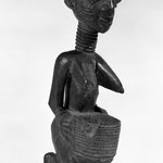 A Kneeling Female Figure Holding a Bowl for Kola Nuts