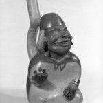 Stirrup Spout Vessel in Form of a Seated Figure