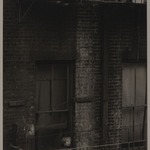 [Untitled] (Tenement, Child on Fire Escape, New York)