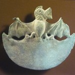 Crescent-Shaped Ornament with Bat