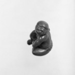 Netsuke in the Form of a Man Applying Moxa