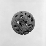 Manju (Bun - Shaped) Netsuke Depicting a Snail Amid Flowers