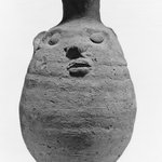 Bottle with Grotesque Face