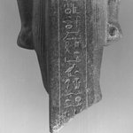 Fragment of a Standing Statue