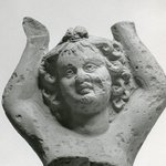 Fragment of a Eros or Female Statuette