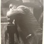 [Untitled] (Man with Hat Leaning on a Fence)