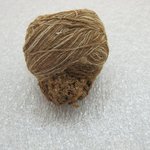 Cone of Brown and White Yarn