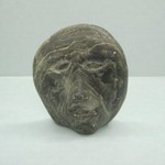 Miniature Stone Head in Relief