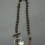 String of Brown Beads with Medallion