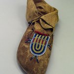 Moccasin with Blue,Yellow, White and Red Beading