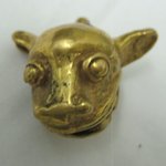 Gold Bell in the Form of an Animal Head with Ball Inside