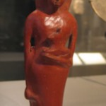 Figure Vase of Woman Holding Dog