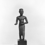 Small Figure of a Priest Walking
