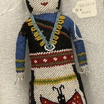 Beaded Doll of woman carrying a jar