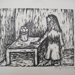 Woman Standing Beside Table