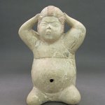 Seated Figure with Arms Raised to Head