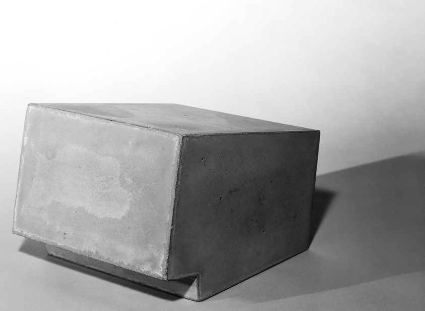 Dean McNeil (American, 1957-2015). <em>Untitled</em>, 1987-1989. Television and radio in cement, 7 x 9 x 11 in. Brooklyn Museum, Gift of Edward A. Bragaline, by exchange, 1990.105. © artist or artist's estate (Photo: Brooklyn Museum, 1990.105_bw.jpg)