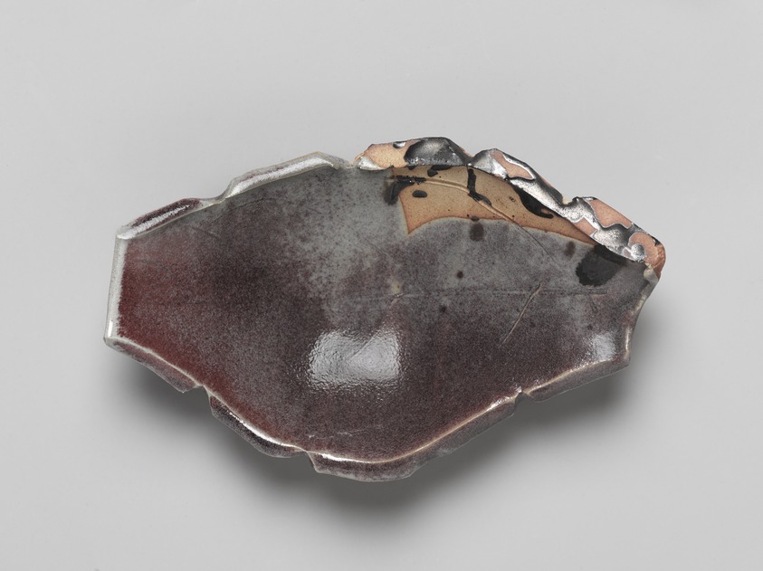 Hamanaka Gesson (Japanese, born 1943). <em>Dish in the Shape of a Leaf, Part of a Set of 6</em>, 2006. Glazed stoneware with kinyo copper glaze, 1 3/8 × 5 1/8 × 7 1/2 in. (3.5 × 13 × 19 cm). Brooklyn Museum, Gift of Dr. Susan L. Beningson in memory of Leslie Beller, 2017.28.1 (Photo: , 2017.28.1_PS9.jpg)