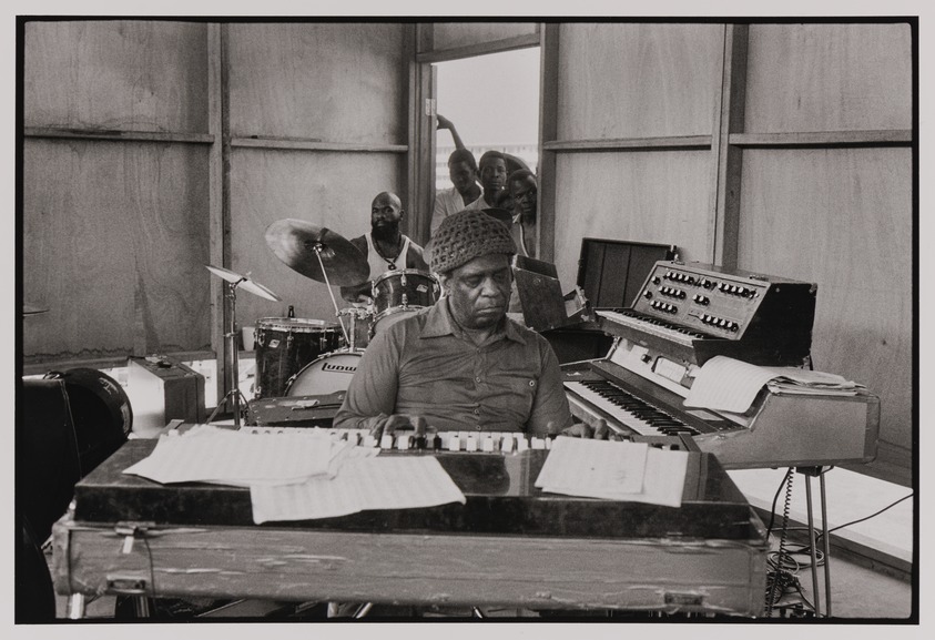 Marilyn Nance (American, born 1953). <em>Musician Sun Ra at Keyboards in Rehearsal with the Sun Ra Arkestra</em>, 1977. Gelatin silver print, 8 × 10 in. (20.3 × 25.4 cm). Brooklyn Museum, Purchased with funds given by the Charina Endowment Fund, 2021.13.2. © artist or artist's estate (Photo: Brooklyn Museum, 2021.13.2_PS20.jpg)