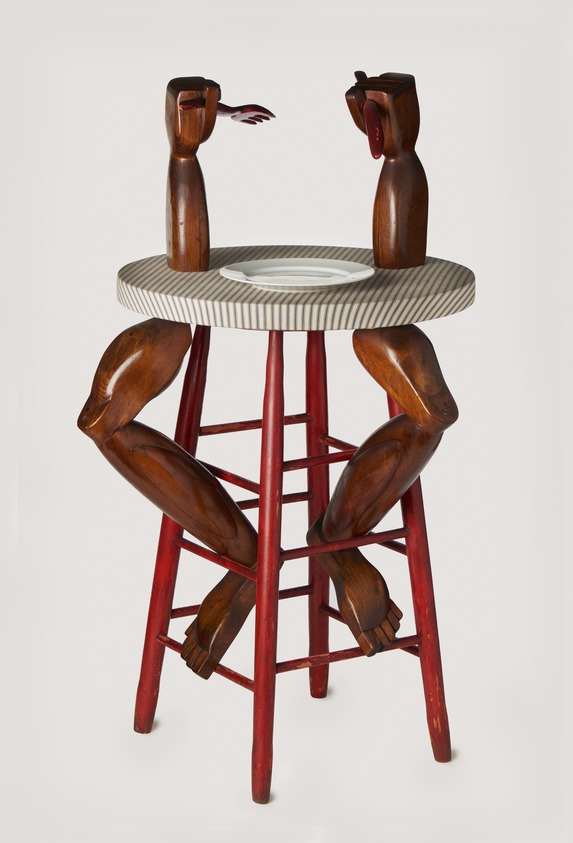 Kate Millett (1934 - 2017). <em>Frustration; also known as Dining Alone</em>, 1966-67. Mixed media (wood, cloth, ceramics; found and carved objects), 43 1/2 × 26 in. (110.5 × 66 cm). Brooklyn Museum, Gift of Catharine Stimpson in Honor of the Artist
, 2022.31. © artist or artist's estate (Photo: Brooklyn Museum, 2022.31_PS11.jpg)