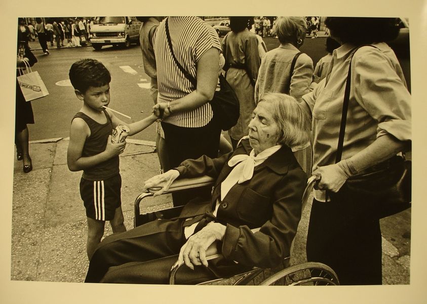 Richard Sandler. <em>Mortality and a cherry coke: 5th Ave and 57th St., NYC 1984</em>, 1992. Gelatin silver print, Sheet: 15 3/4 x 19 3/4 in. (40 x 50.2 cm). Brooklyn Museum, Gift of the artist, 1992.220.2. © artist or artist's estate (Photo: Brooklyn Museum, CUR.1992.220.2.jpg)