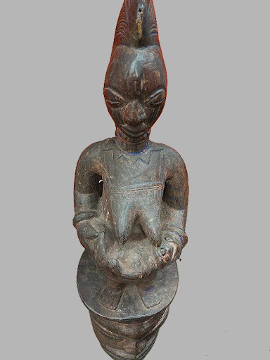 Yor&ugrave;b&aacute;. <em>Epa Mask with Maternity Figure</em>, 20th century. wood, pigment, 40 1/2 x 11 3/4 x 12 1/2 in. (102.9 x 29.8 x 31.8 cm). Brooklyn Museum, Gift of Liren Wei, 2025.85.2 (Photo: Courtesy of Liren Wei, CUR.2025.85.2_front01.jpg)