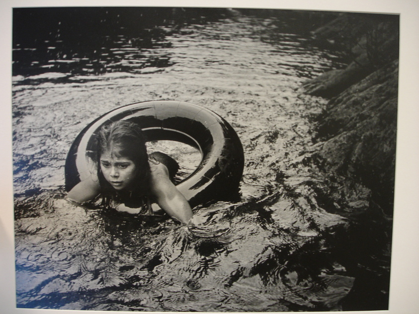 W. Eugene Smith (American, 1918-1978). <em>[Untitled] (Juanita Floating in Inner Tube)</em>, 1958. Gelatin silver photograph, Sheet: 11 x 13 7/8 in. (27.9 x 35.2 cm). Brooklyn Museum, Gift of Philip Goutell, 87.245.42. © artist or artist's estate (Photo: Brooklyn Museum, CUR.87.245.42.jpg)