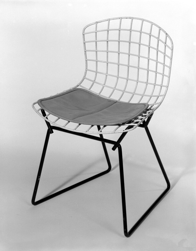 Harry Bertoia (American, born Italy, 1915-1978). <em>Child's Side Chair, Model 426-2</em>, Designed 1950-52; Manufactured 1953. Rubber-coated metal, metal, vinyl, (a) Chair:  20 x 13 x 12 1/2 in. (50.8 x 33 x 31.8 cm). Lent by Mr. and Mrs. Jack Buchanek, L84.8a-b. © artist or artist's estate (Photo: Brooklyn Museum, L84.8a-b_bw.jpg)